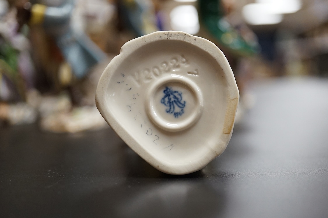 A group of twenty German porcelain monkey band figures, largest 15.5cm high